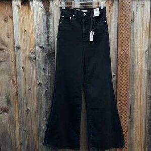 Levi’s premium high loose flare jeans in black size 25